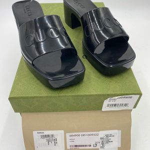 Women’s Gucci rubber logo slides size 37.5 made in Italy